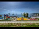 Apartementen Rajka - 20 m from beach: Rajka(4) Koromacno - Istrië  - speeltuin