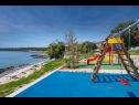 Apartementen Rajka - 20 m from beach: Rajka(4) Koromacno - Istrië  - speeltuin