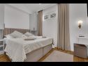 Apartementen Prgo - with view and parking: A1(6), A2(6), A3(4) Makarska - Riviera Makarska  - Appartement - A3(4): slaapkamer
