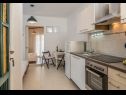 Apartementen Milica - sea view : A1(2+2), A2(2+2) Krilo Jesenice - Riviera Omis  - Appartement - A2(2+2): keuken en eetkamer