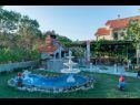 Apartementen Mig - with beautiful garden: A1(2+1), A3(4+1), A4(4+1) Supetarska Draga - Eiland Rab  - tuin