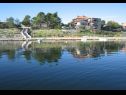 Apartementen Ljilja - 10m from the sea with parking: A2(2+2), A3(2+2), A4(12) Nin - Riviera Zadar  - huis
