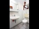 Apartementen Let - 5 m from sea : A1(4), A4(4) Sukosan - Riviera Zadar  - Appartement - A1(4): badkamer met toilet