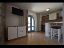 Apartementen Insula Insule - rustic & peaceful: SA1(2+1), SA2(2+1) Skrbcici - Eiland Krk  - Studio-appartment - SA1(2+1): eetkamer