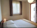 Apartementen Smilja - 150 m from pebble beach: A1(2+2), A2(2+1), SA3(2) Baska Voda - Riviera Makarska  - Appartement - A1(2+2): slaapkamer