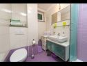 Apartementen Palmina - comfort apartment: A1 veliki (6),  A2 žuti (4+1), A3 lila (2), SA4 bijeli (2) Makarska - Riviera Makarska  - Appartement -  A2 žuti (4+1): badkamer met toilet