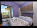 Apartementen Palmina - comfort apartment: A1 veliki (6),  A2 žuti (4+1), A3 lila (2), SA4 bijeli (2) Makarska - Riviera Makarska  - Appartement -  A2 žuti (4+1): slaapkamer