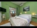 Apartementen Palmina - comfort apartment: A1 veliki (6),  A2 žuti (4+1), A3 lila (2), SA4 bijeli (2) Makarska - Riviera Makarska  - Appartement -  A2 žuti (4+1): slaapkamer
