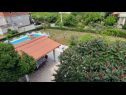 Apartementen Ankica - pool & garden A1(9), A2(8) Kampor - Eiland Rab  - moestuin