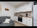 Apartementen Mil - 30 m from beach: A1(2+2), SA2 novi(0+4), SA3(0+3) Ribarica - Riviera Senj  - Appartement - A1(2+2): keuken en eetkamer