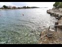 Apartementen Ziva - by the beach; A1(6), A2(4), A3 (2+1) Baai Lozica (Rogoznica) - Riviera Sibenik  - Kroatië  - strand