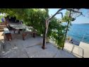 Apartementen Žeki - 20 m from the sea: A1(3), SA2 (2) Seget Vranjica - Riviera Trogir  - strand