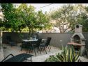 Apartementen Florio - garden & free parking: A1(5) Trogir - Riviera Trogir  - komin