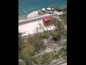 Apartementen Ivan  - 15 m from beach: A1(7), SA2(2), A3(2+1) Vinisce - Riviera Trogir  - parkeerplaats
