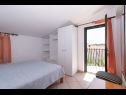 Apartementen Din - 40 m from sea: A1(5+1), A2(2+1), A3(2+1), A4(2+2), A5(2+2) Kukljica - Eiland Ugljan  - Appartement - A4(2+2): slaapkamer